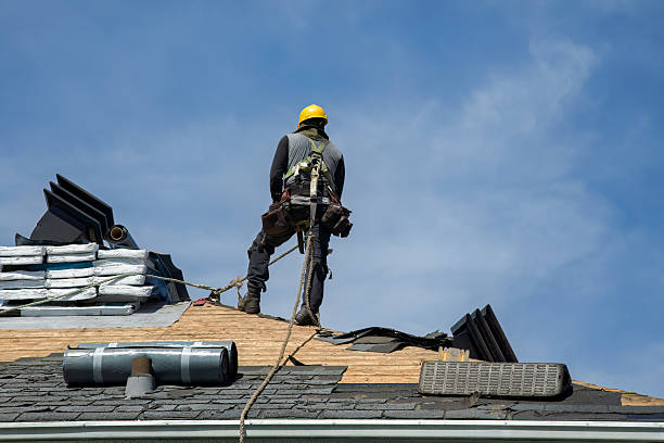 Professional Roofing technician working in Merrill, IA
